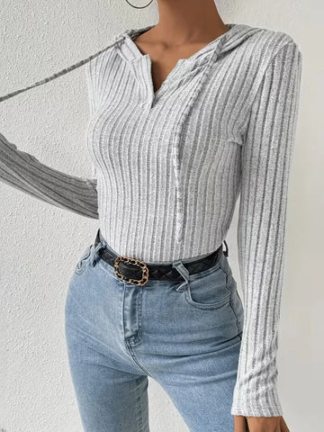 Bodysuit met capuchon en lange mouwen