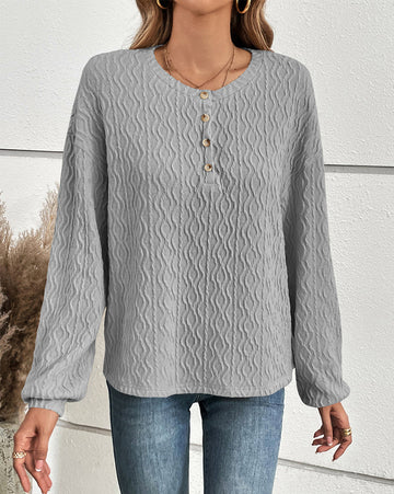 Effen topje met knopen in de kleur Grijs voor dames in stijl ideaal voor de herfst.