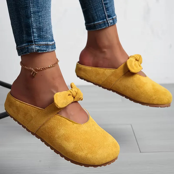 Badslipper met strikdesign
