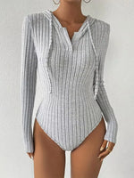 Bodysuit met capuchon en lange mouwen
