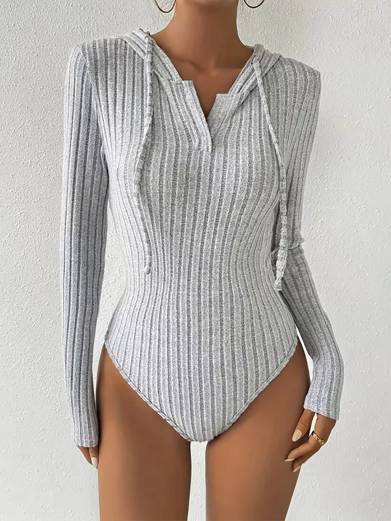 Bodysuit met capuchon en lange mouwen