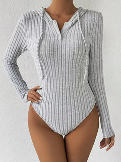 Bodysuit met capuchon en lange mouwen