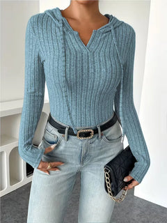 Bodysuit met capuchon en lange mouwen