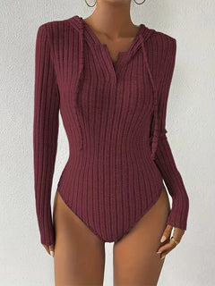 Bodysuit met capuchon en lange mouwen