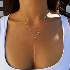 Ketting met rijstparels en franjes