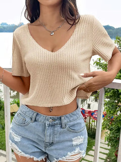 Beige crop top met V-hals