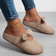 Badslipper met strikdesign