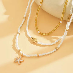 Ketting met schelp en ster
