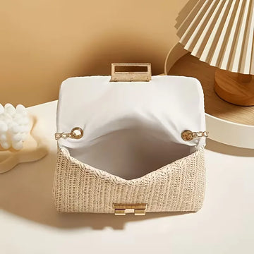Woven clutch met gouden sluiting