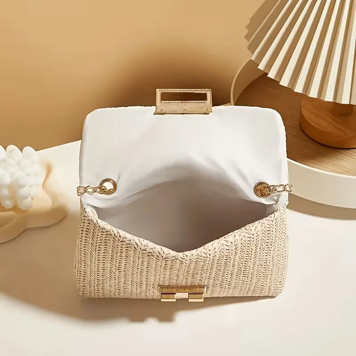 Woven clutch met gouden sluiting