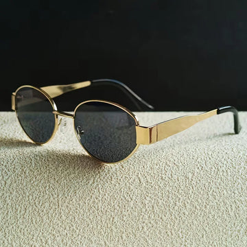 Zonnebril met ovaal metallic frame
