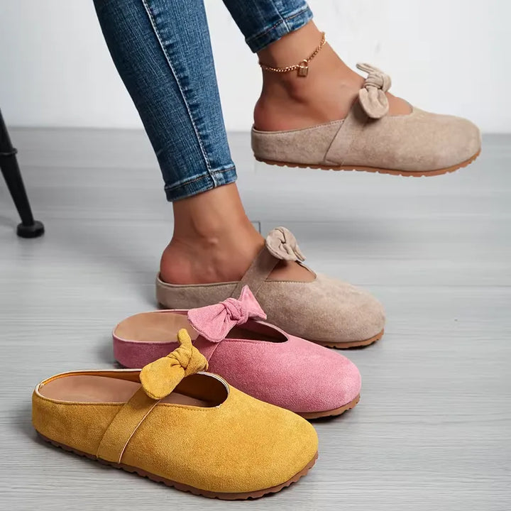 Badslipper met strikdesign