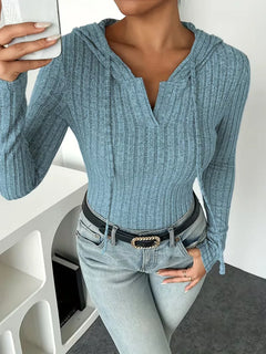 Bodysuit met capuchon en lange mouwen