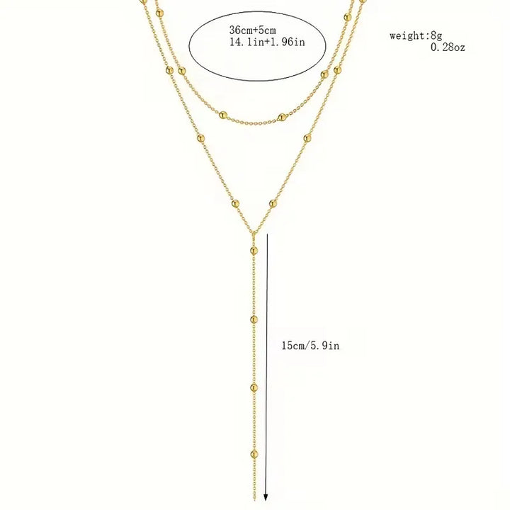 Ketting met rijstparels en franjes