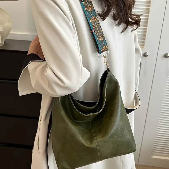 Schoudertas met kleurrijke strap