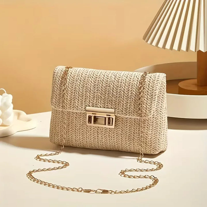 Woven clutch met gouden sluiting