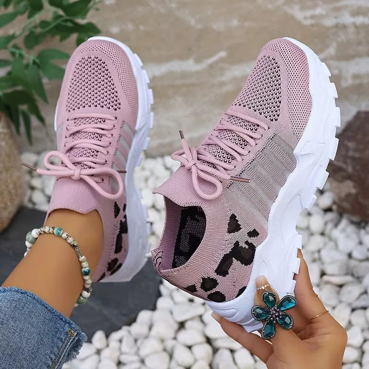 Lage sneaker met leopard print