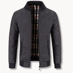 Gequilt jas met rits en ronde hals