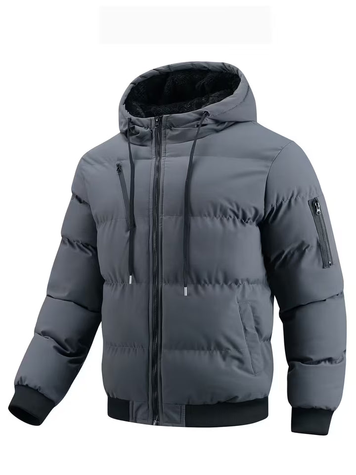 Gewatteerde jas met capuchon en fleece voering
