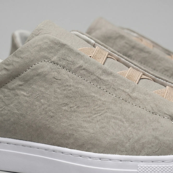 Slip-on sneakers met suède