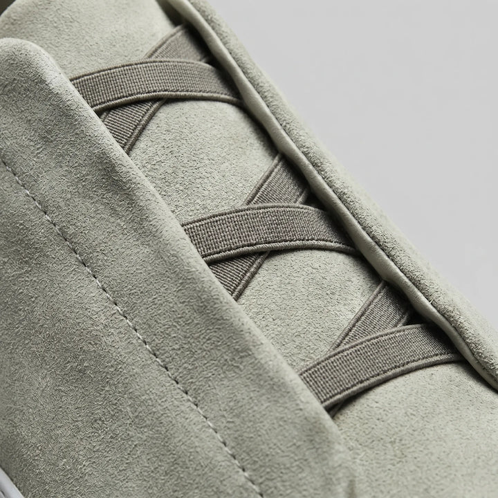 Slip-on sneakers met suède