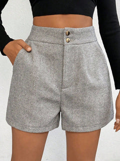 Korte broek met visgraatmotief en hoge taille
