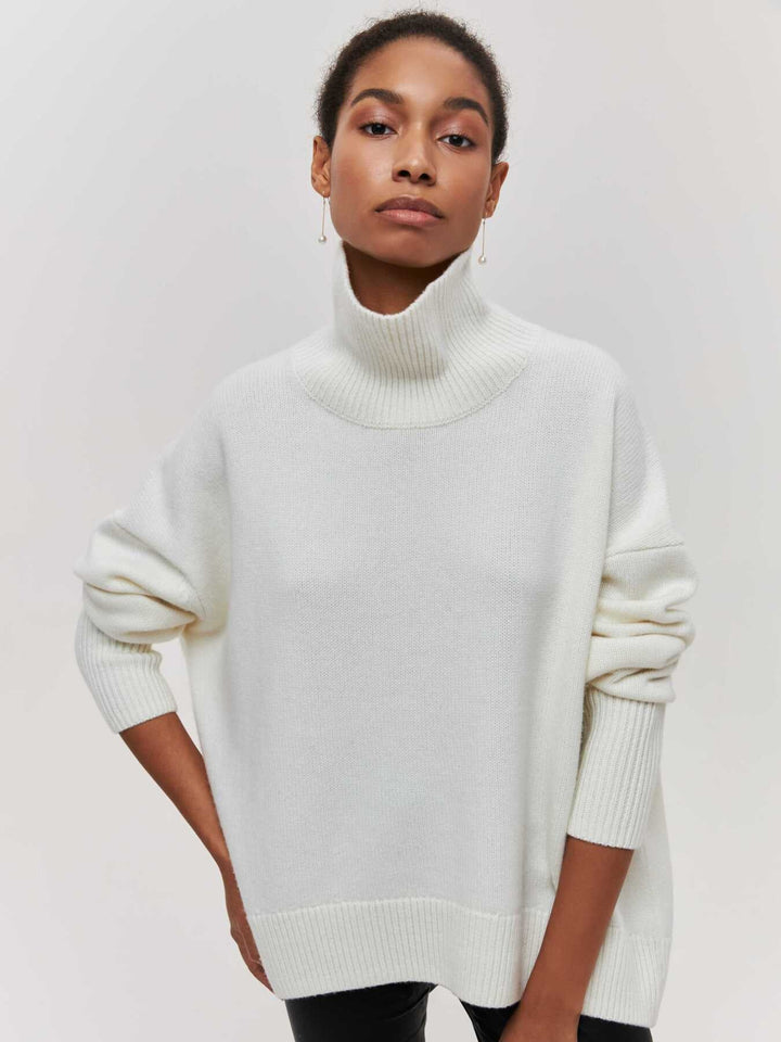 Oversized trui met hoge col en ribgebreide afwerking