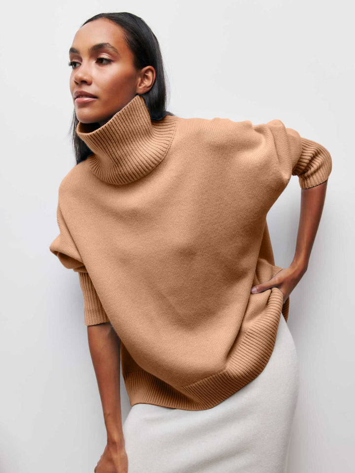 Oversized trui met hoge col en ribgebreide afwerking