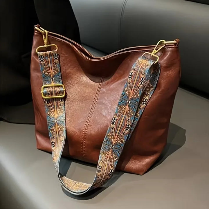 Schoudertas met kleurrijke strap