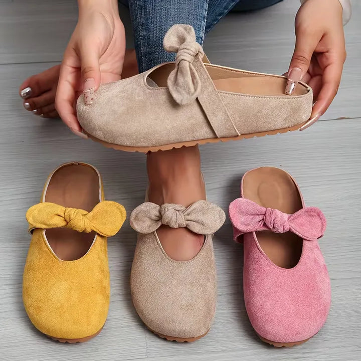 Badslipper met strikdesign