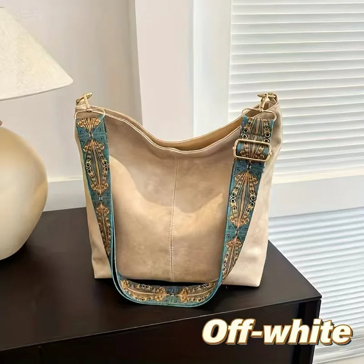 Schoudertas met kleurrijke strap