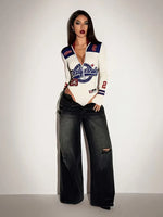 Bodysuit met capuchon en lange mouwen