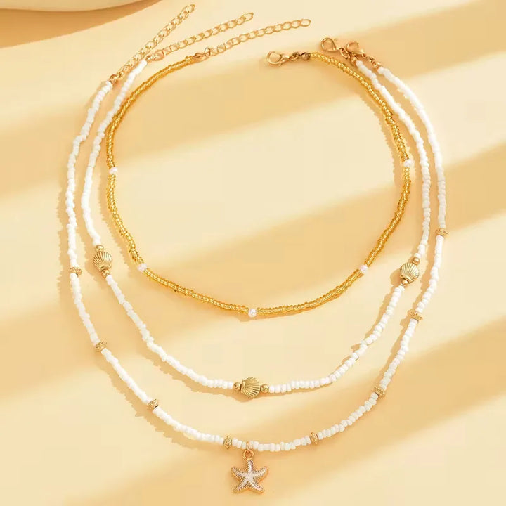 Ketting met schelp en ster