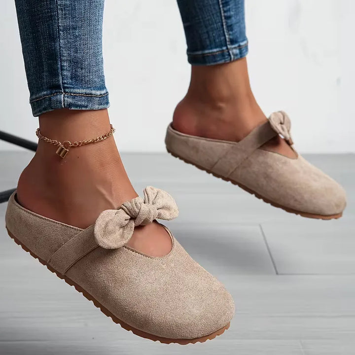 Badslipper met strikdesign