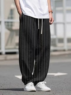 Wide fit pantalons met verticale strepen
