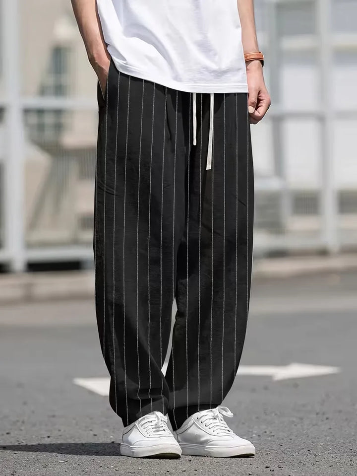 Wide fit pantalons met verticale strepen