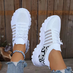 Lage sneaker met leopard print
