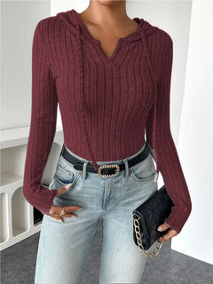 Bodysuit met capuchon en lange mouwen