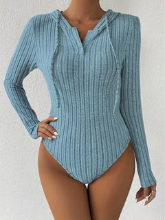Bodysuit met capuchon en lange mouwen