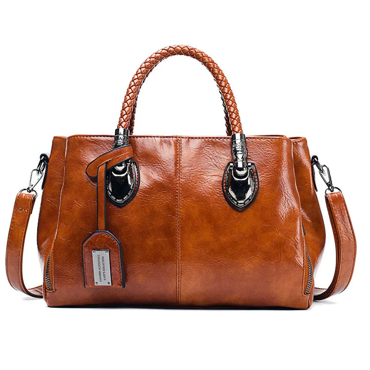 Grote leren tas - een perfecte combinatie van ruimte, luxe en elegantie. Gemaakt van hoogwaardig leer, met een ruim en georganiseerd interieur, is deze tas ideaal voor werk en vrije tijd. Voeg een vleugje praktische luxe toe aan elke outfit!