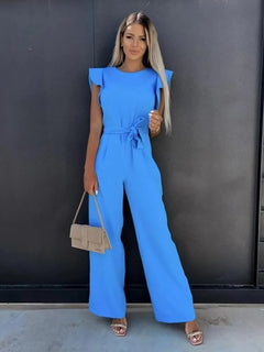 Deze jumpsuit combineert stijl, comfort en speelsheid met prachtige ruches mouwen en een ceintuur voor een flatterende en trendy uitstraling, geschikt voor diverse gelegenheden. Gemaakt van hoogwaardige materialen en veelzijdig inzetbaar voor zowel formele als informele events. Maattabel beschikbaar voor diverse EU-maten.