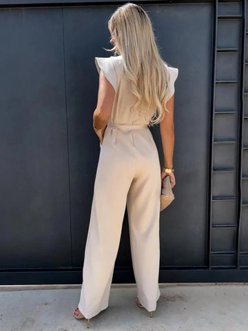 Deze jumpsuit combineert stijl, comfort en speelsheid met prachtige ruches mouwen en een ceintuur voor een flatterende en trendy uitstraling, geschikt voor diverse gelegenheden. Gemaakt van hoogwaardige materialen en veelzijdig inzetbaar voor zowel formele als informele events. Maattabel beschikbaar voor diverse EU-maten.