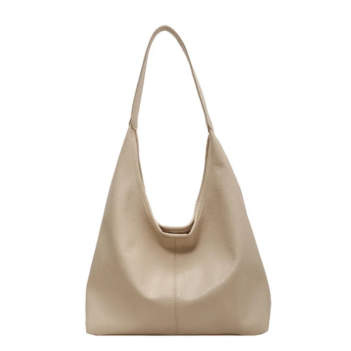 Emma | Grote leren schoudertas voor dames in de kleur Wit voor dames in stijl geschikt voor alle seizoenen.
