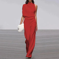 Elegante en tijdloze jumpsuit - de ultieme combinatie van stijl en comfort. Mouwloos met een losse pasvorm voor ultiem gemak en veelzijdigheid.