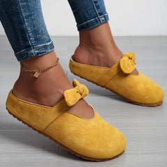 Badslipper met strikdesign