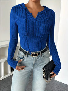 Bodysuit met capuchon en lange mouwen