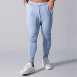Filip | Heren Slim-Fit Joggers voor Fitnessruimte in de kleur Blauw voor heren in Lounge stijl geschikt voor alle seizoenen.
