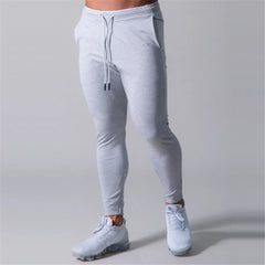 Filip | Heren Slim-Fit Joggers voor Fitnessruimte in de kleur Grijs voor heren in Lounge stijl geschikt voor alle seizoenen.