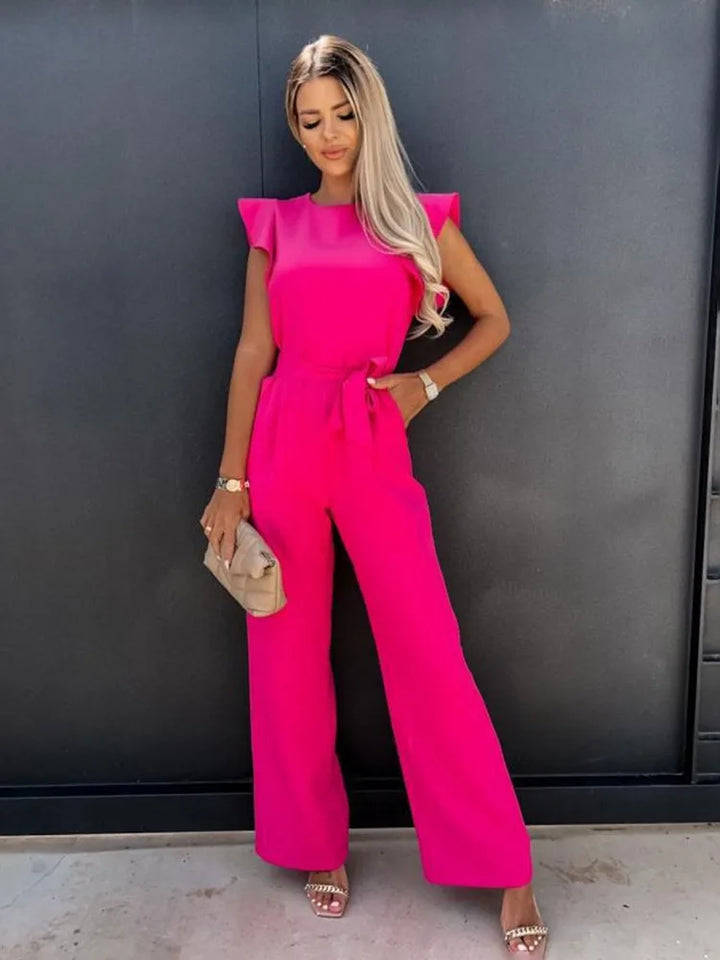 Ultieme elegantie - deze jumpsuit is een stijlvolle keuze met prachtige wijde pijpen voor een trendy uitstraling. Kenmerken zijn onder andere een ronde halslijn, lichte rekbaarheid voor comfort en een perfecte pasvorm die flatteert.