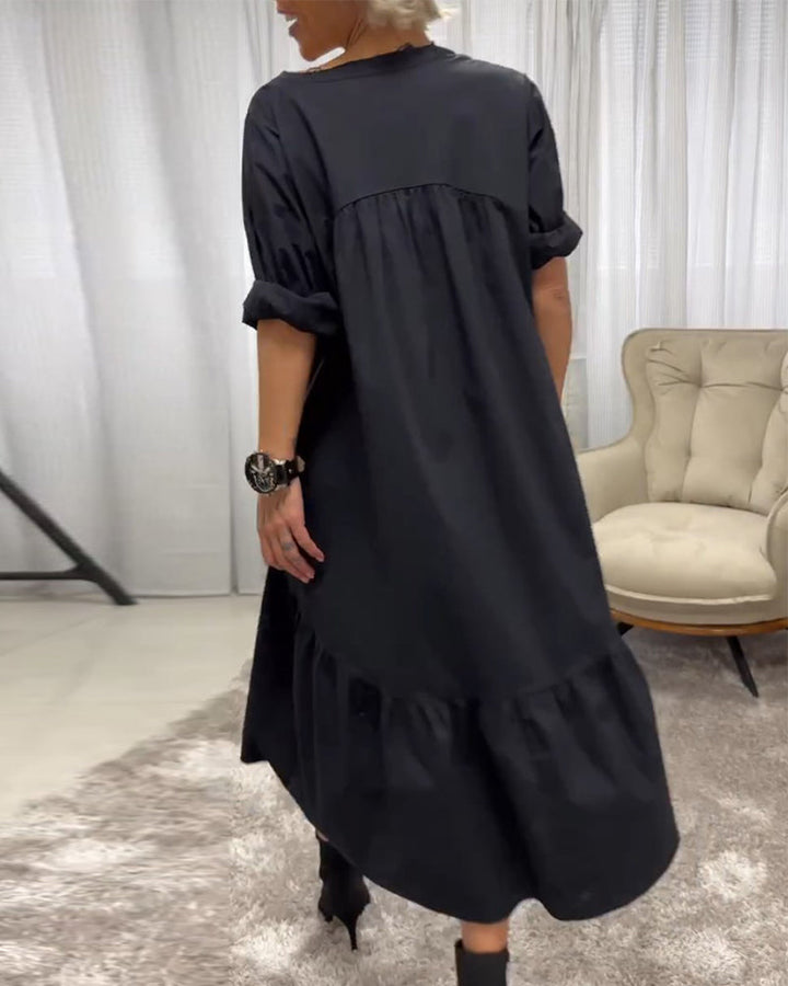 Jurk met 3/4 mouwen en diepe V-hals in de kleur Zwart voor dames in stijl ideaal voor de herfst.